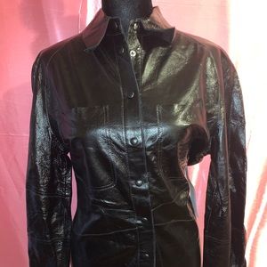 Women’s size 4 brand new with tags top shop, black button-down shirt.